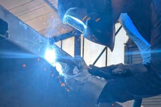 AURA welder fabricating a system